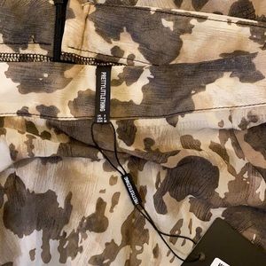 Brown Cow Print Beach Flares